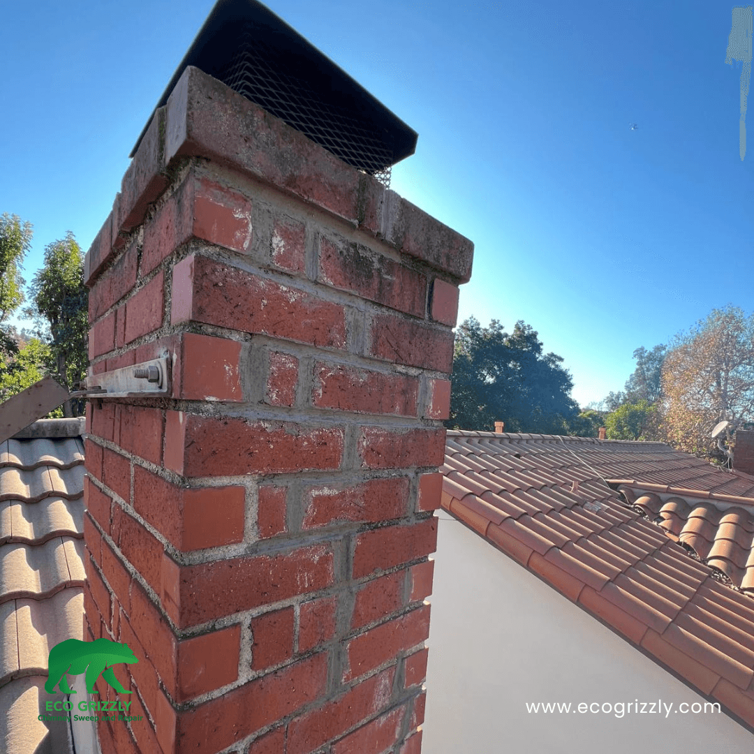 Cracks in chimney masonry filled and sealed during a professional repair