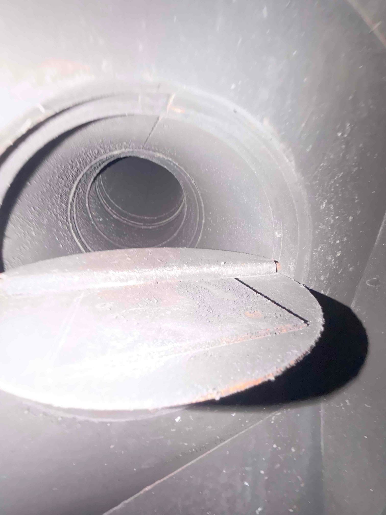 Broken throat damper stuck open before damper clamp installation