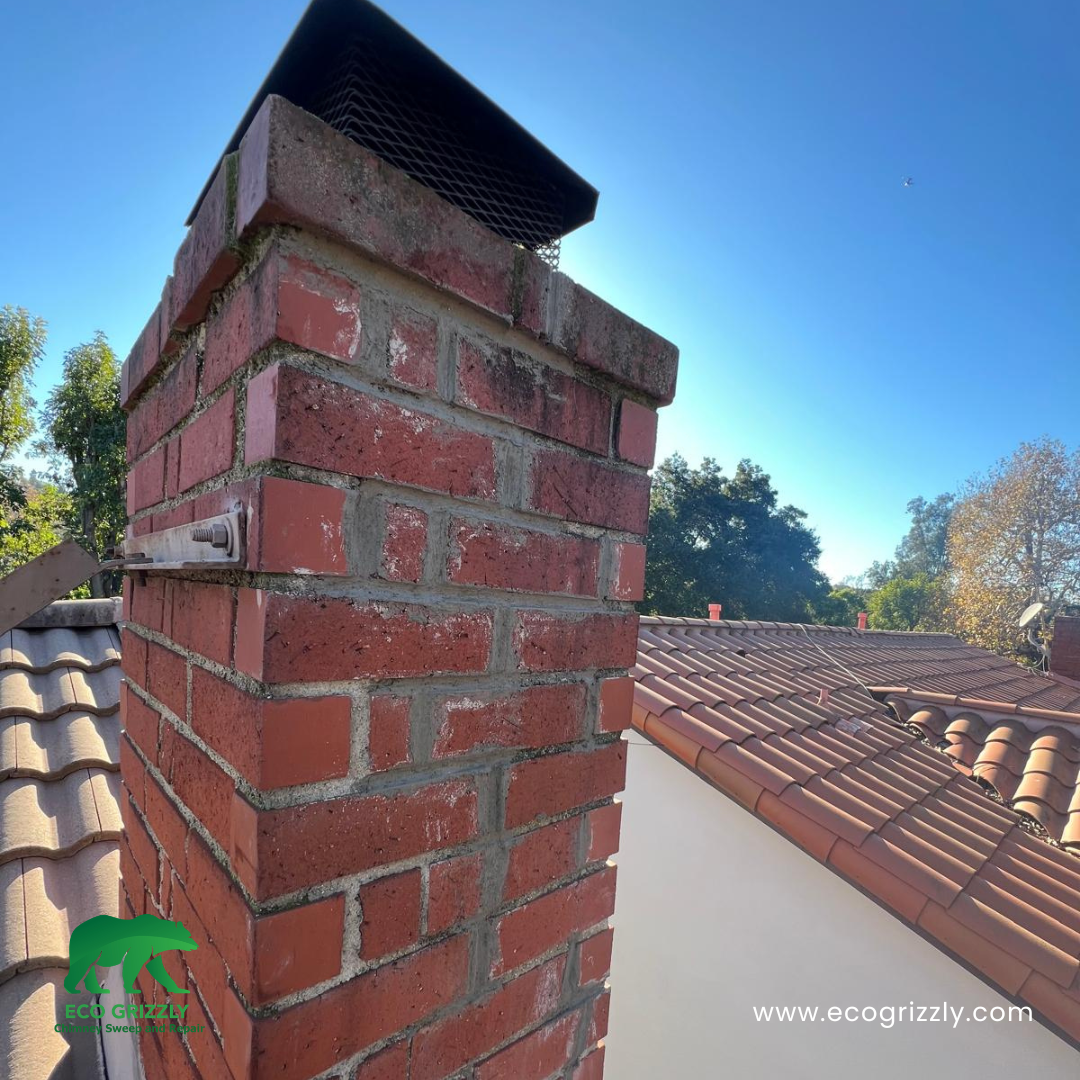 Cracks in chimney masonry filled and sealed during a professional repair
