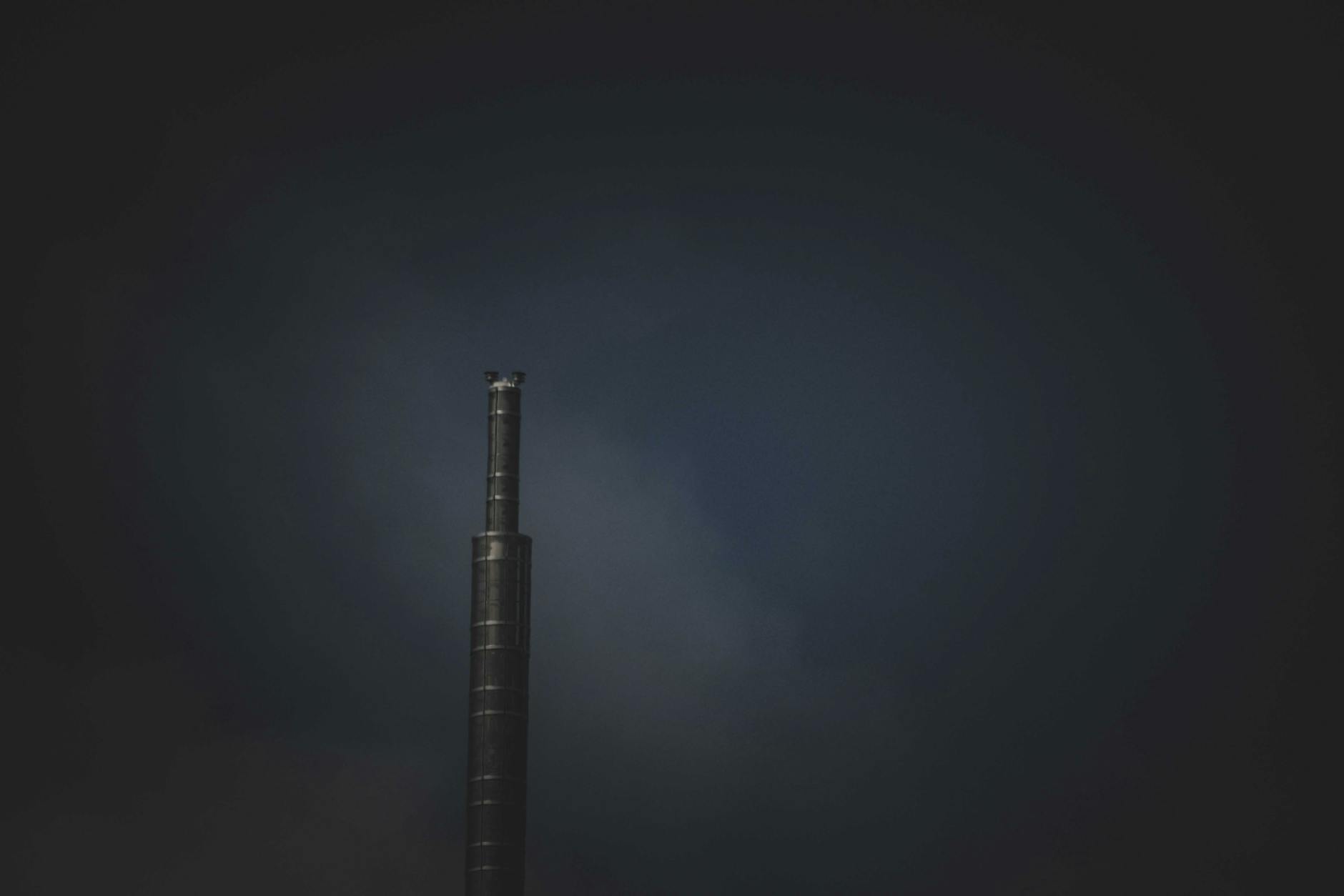 Stainless steel chimney flue liner being installed