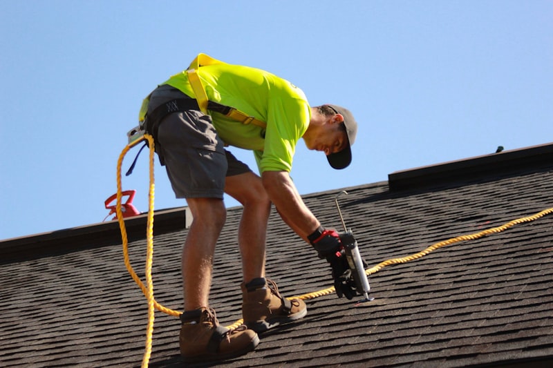 Roofing repair work on shingles